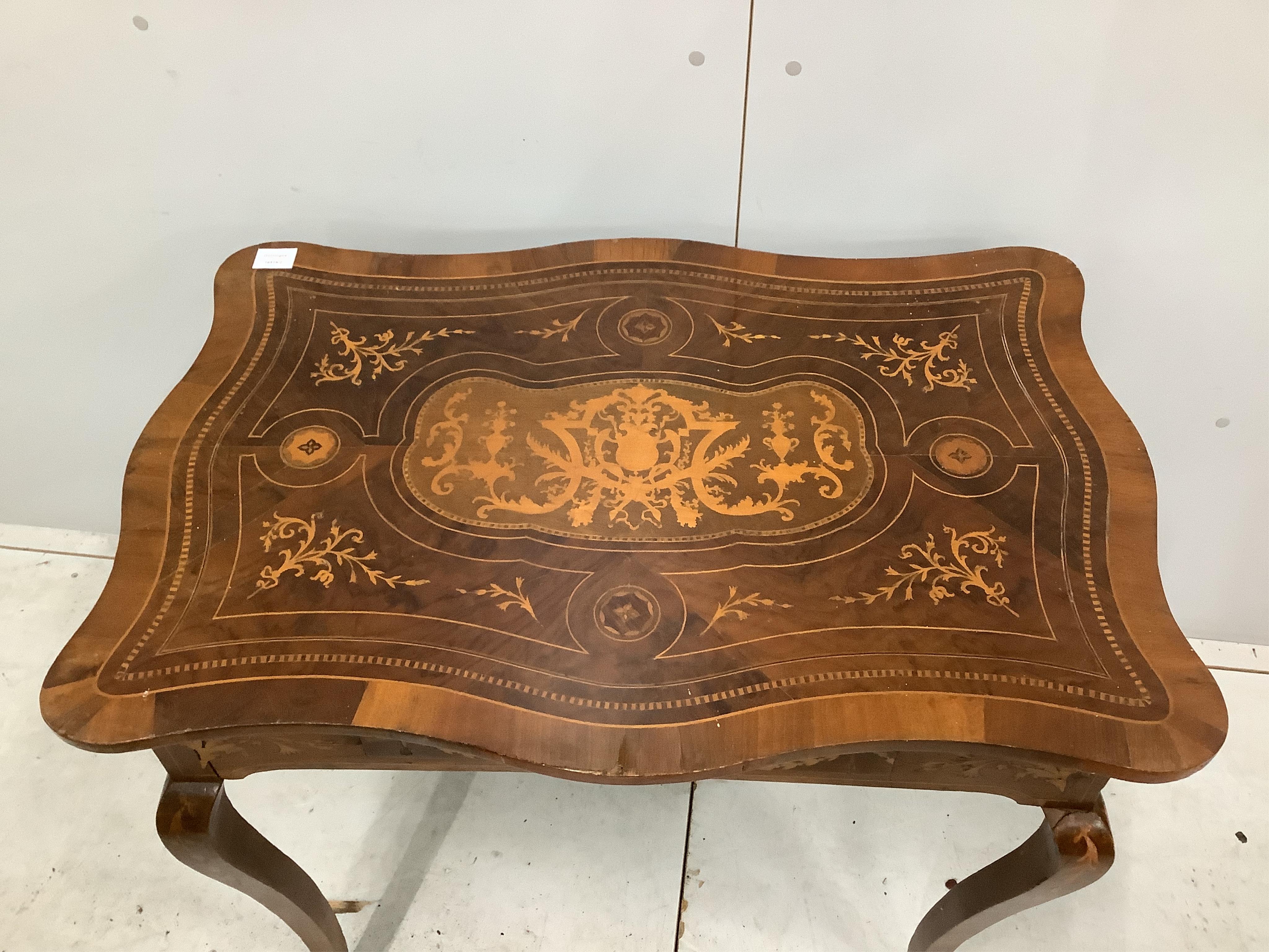 A 19th century Italian marquetry inlaid walnut serpentine side table, fitted drawer, width 88cm, depth 61cm, height 74cm. Condition - fair